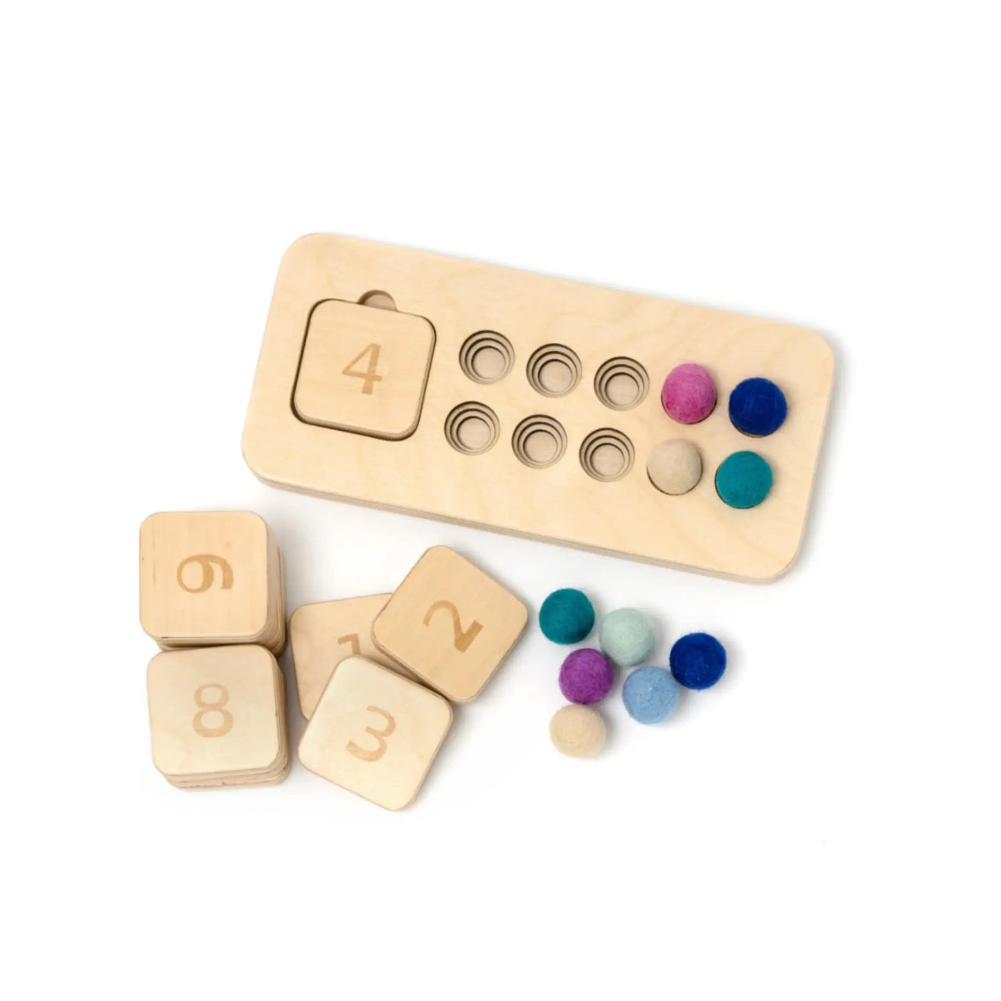 Wooden counting board showing the number four matched with four wool balls and loose numeral tiles