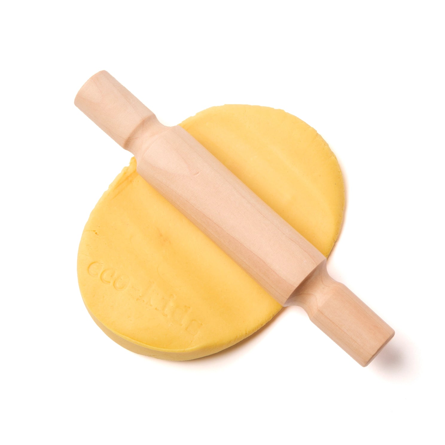 Wooden play dough roller flattening natural dough for open-ended sensory play