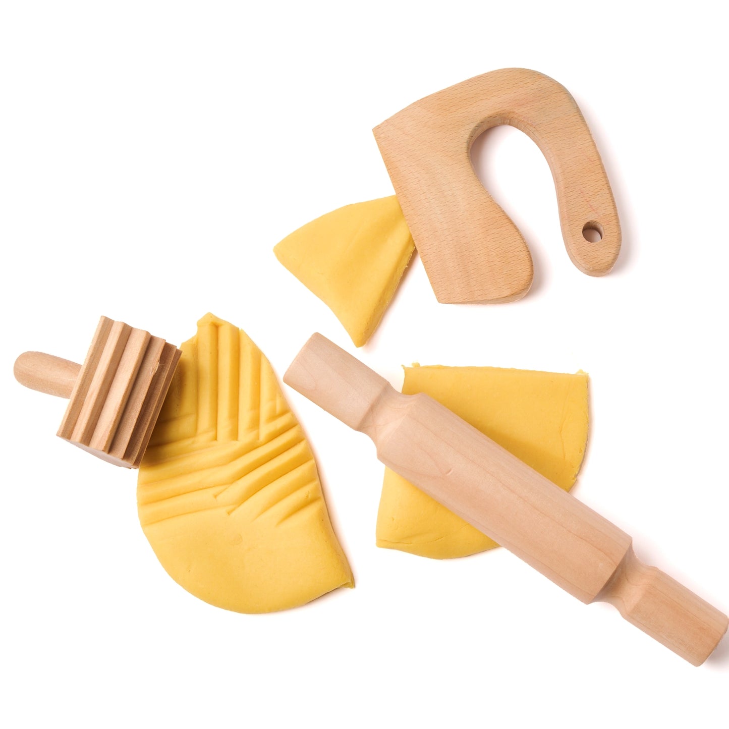 Wooden play dough tools used for cutting, rolling, and stamping yellow play dough