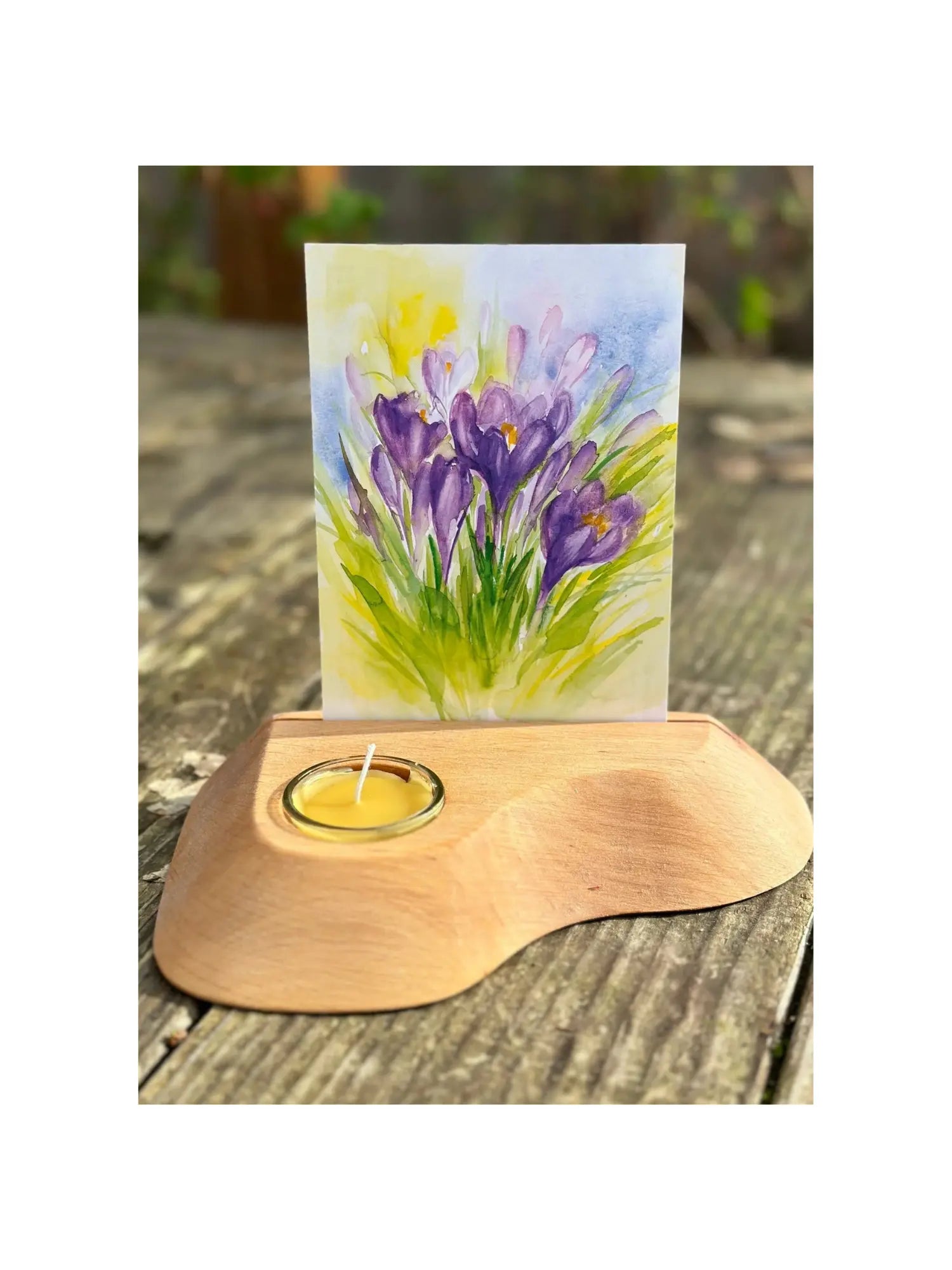 Alderwood Photo and Postcard Holder with Tealight and a postcard of irises on rustic outdoor wooden table