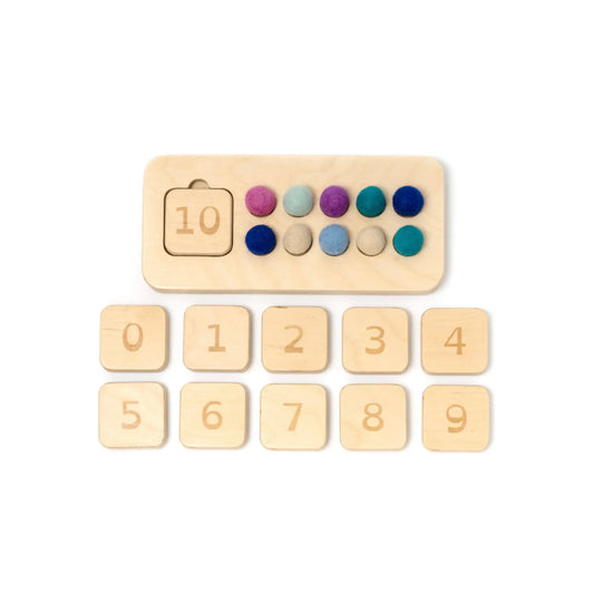 Wooden counting board with numeral tiles from 0 to 10 and colorful wool balls for quantity matching