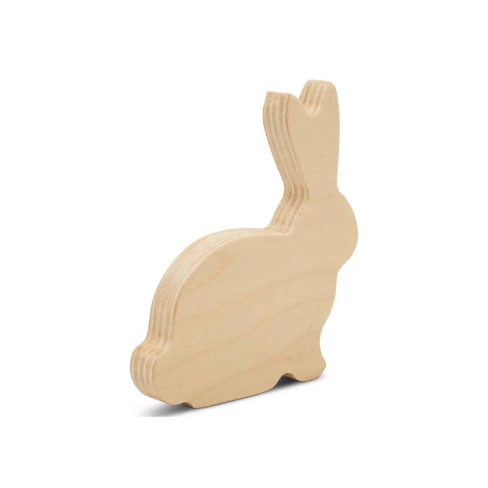 Unfinished rabbit wood cutout at an angled view for a spring nature table decor