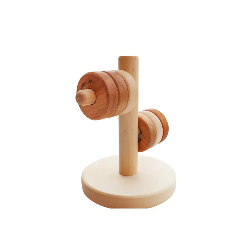 Wooden stacking toy with large-hole and small-hole discs