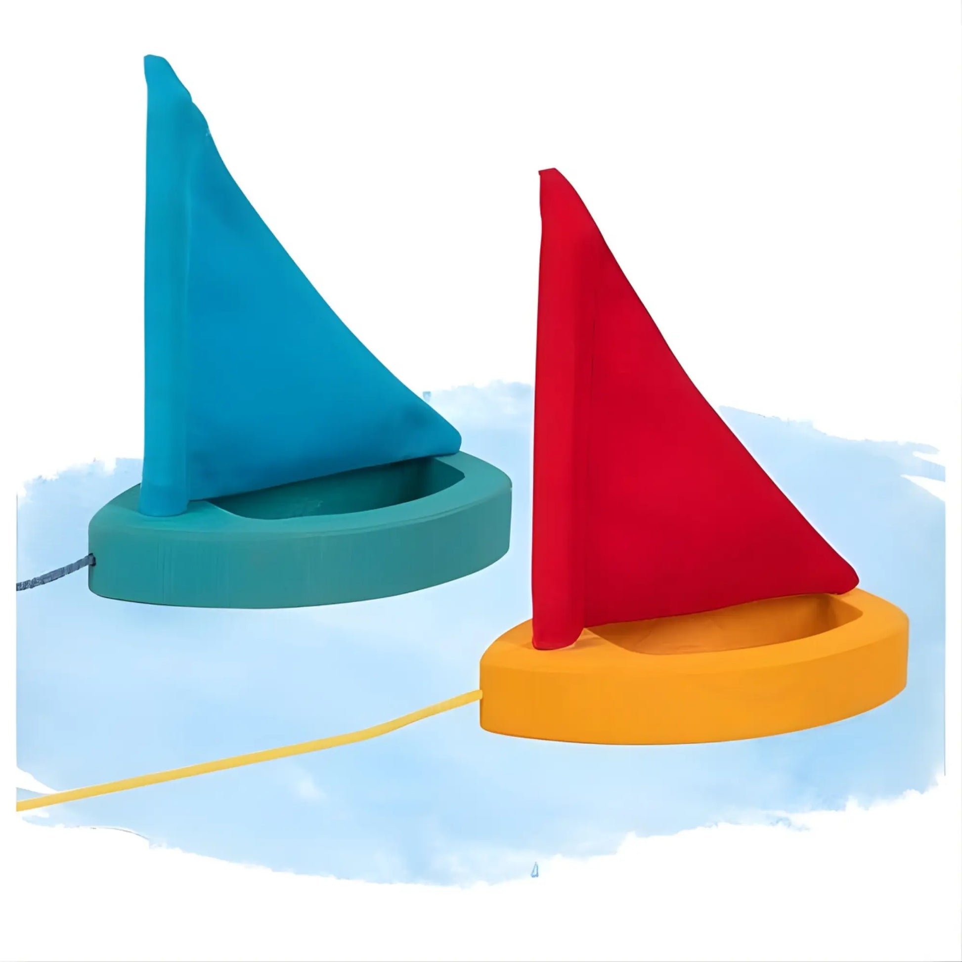Two toy sailboats by goki on a blue and white background - one with a red sail and yellow boat and another with a blue sail and teal boat