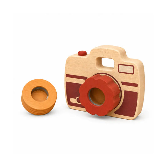 Wooden toy camera for toddlers with interchangeable lens piece on a white background
