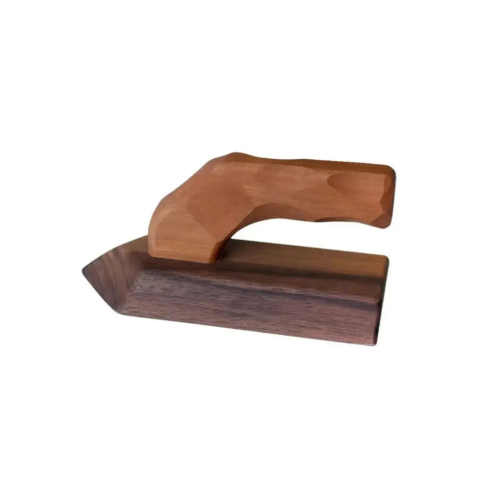 Side view of wooden toy iron with cherry wood handle and walnut base