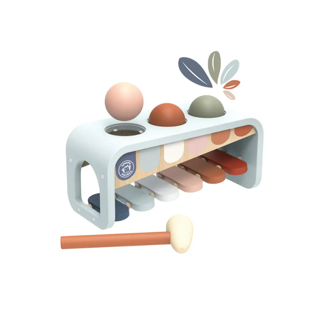 Wooden xylophone hammer bench toy flipped to show xylophone underside
