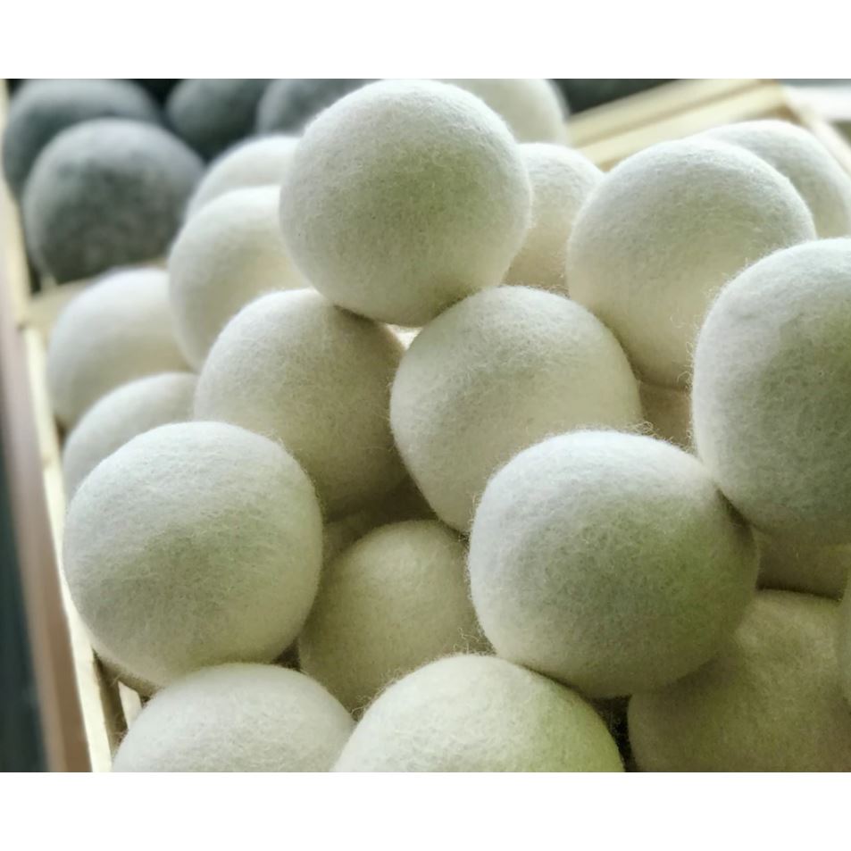 Close up of white wool dryer balls