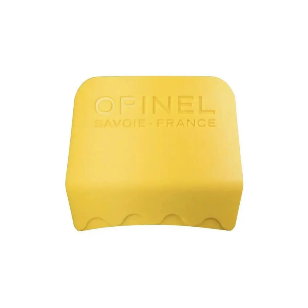 Yellow Opinel kids finger guard for cutting with a knife