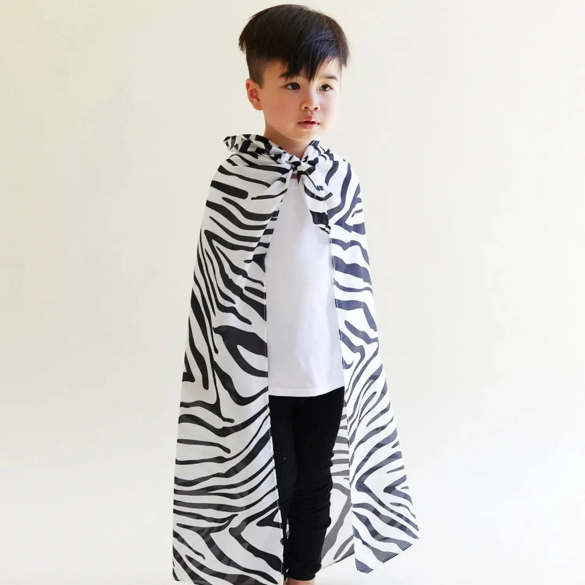 Sarah's Silks Zebra Playsilk worn as a flowing cape for children's animal dress-up and pretend play