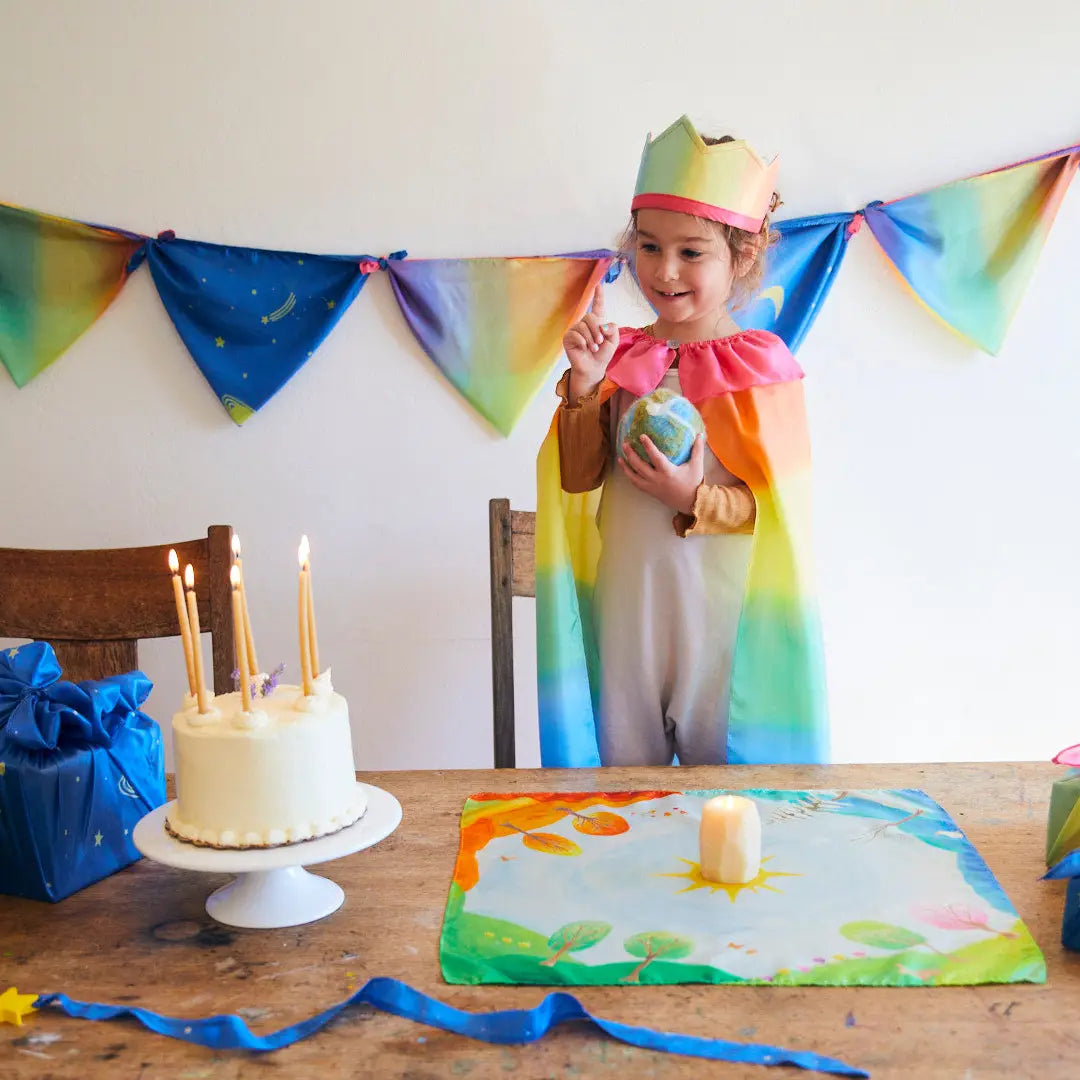 Around the World Mini Playsilk Showing the four seasons with candle in the middle and birthday cake