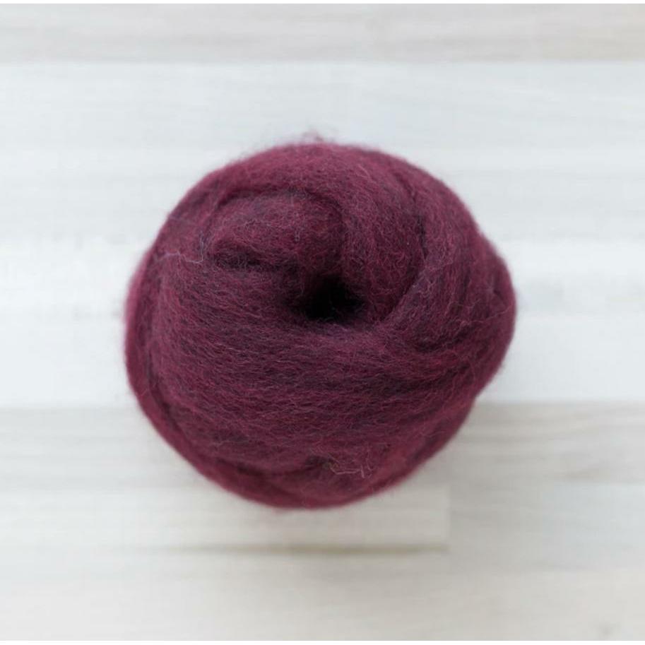 knot of bing cherry wool roving by Felted Sky for dry needle felting and wrapping
