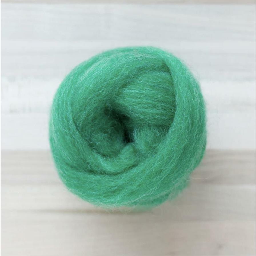 knot of cucumber green wool roving by Felted Sky for dry needle felting and wrapping