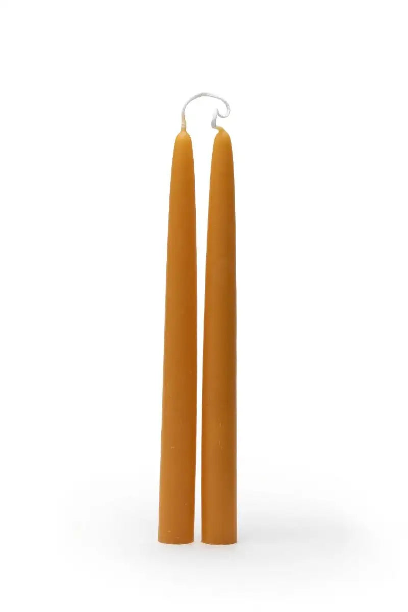 Pair of Eco Friendly Hand Dipped Beeswax Taper Candles on a white background