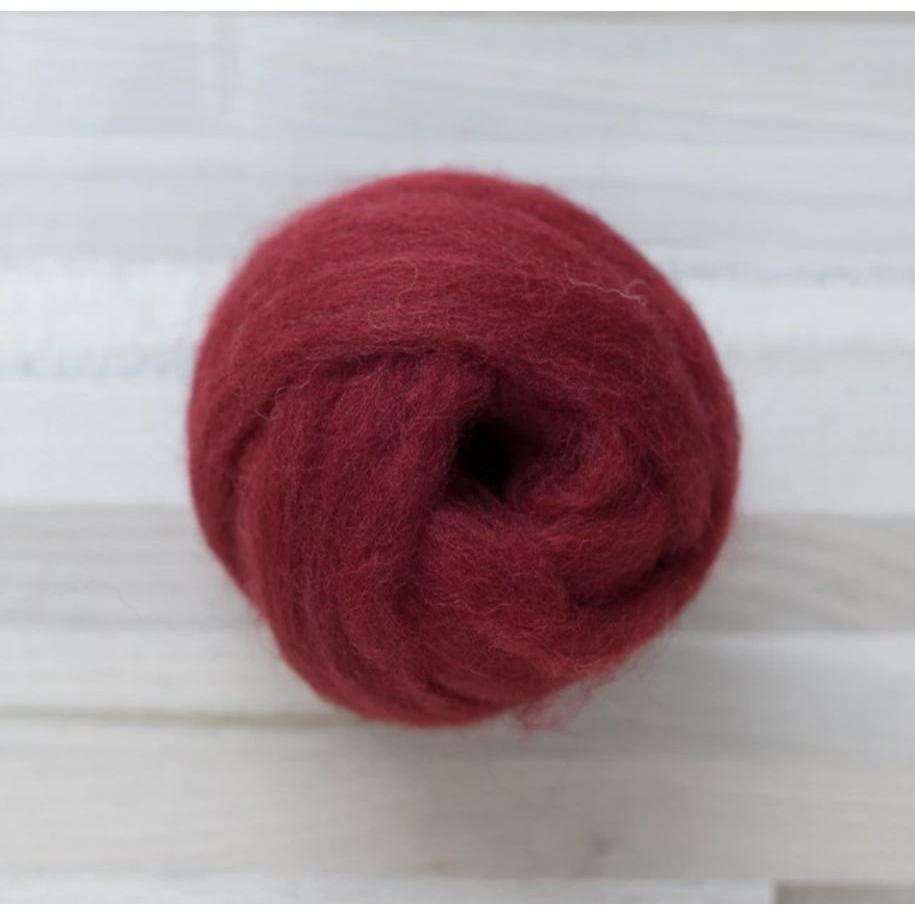 knot of lipstick wool roving by Felted Sky for dry needle felting and wrapping