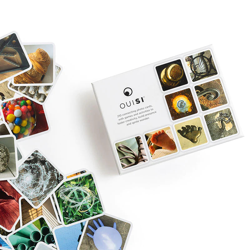 OuiSi visual connection game cards displayed on table with box
