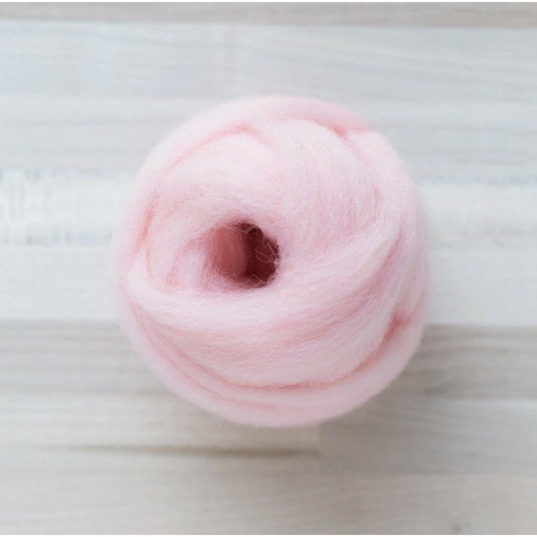 knot of pink lemonade wool roving by Felted Sky for dry needle felting and wrapping