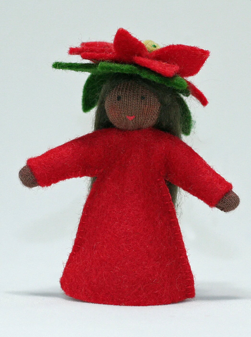 Poinsettia Flower Fairy Doll by Ambrosius with dark hair and dark skin tone