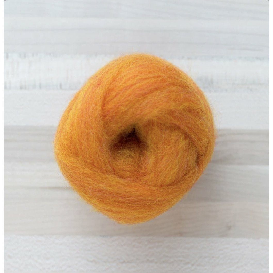 knot of pumpkin wool roving by Felted Sky for dry needle felting and wrapping