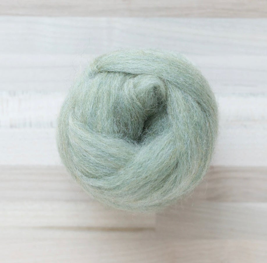 knot of sagebrush green wool roving by Felted Sky for dry needle felting and wrapping