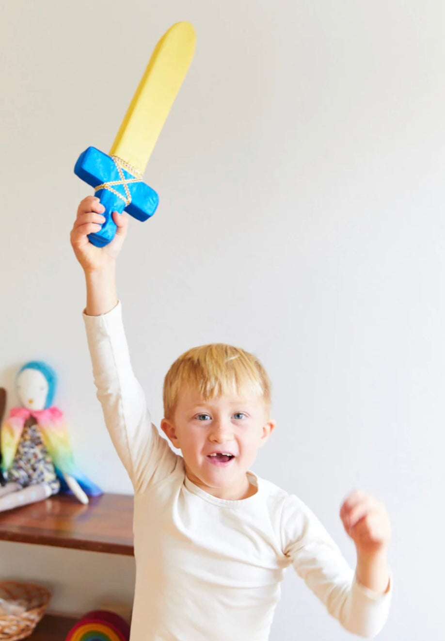 Child playing with a Soft Sword - Silk + Foam