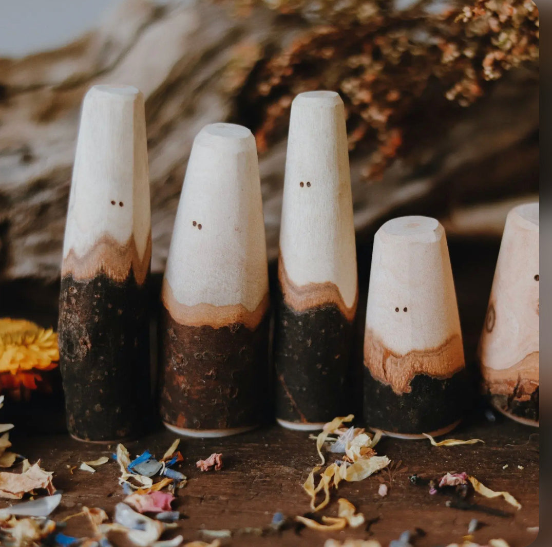 Tree People wooden figures in a woodland-inspired scene for imaginative storytelling