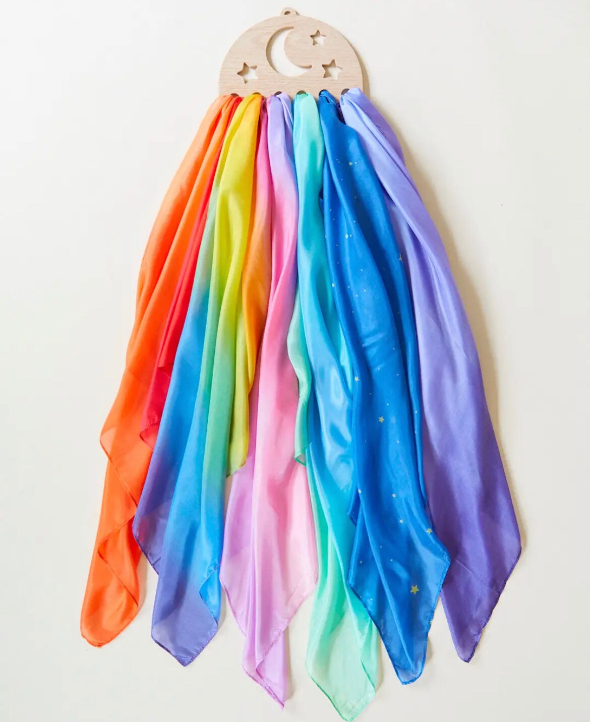 Sarah's Silks Wooden Playsilk Holder Moon and Stars with multi-colored scarves